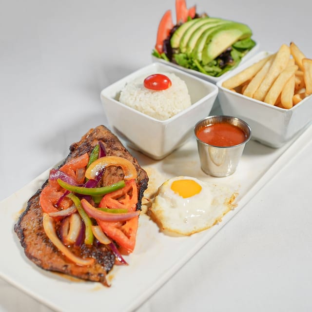 Beefsteak in a Creole Sauce / Churrasco.